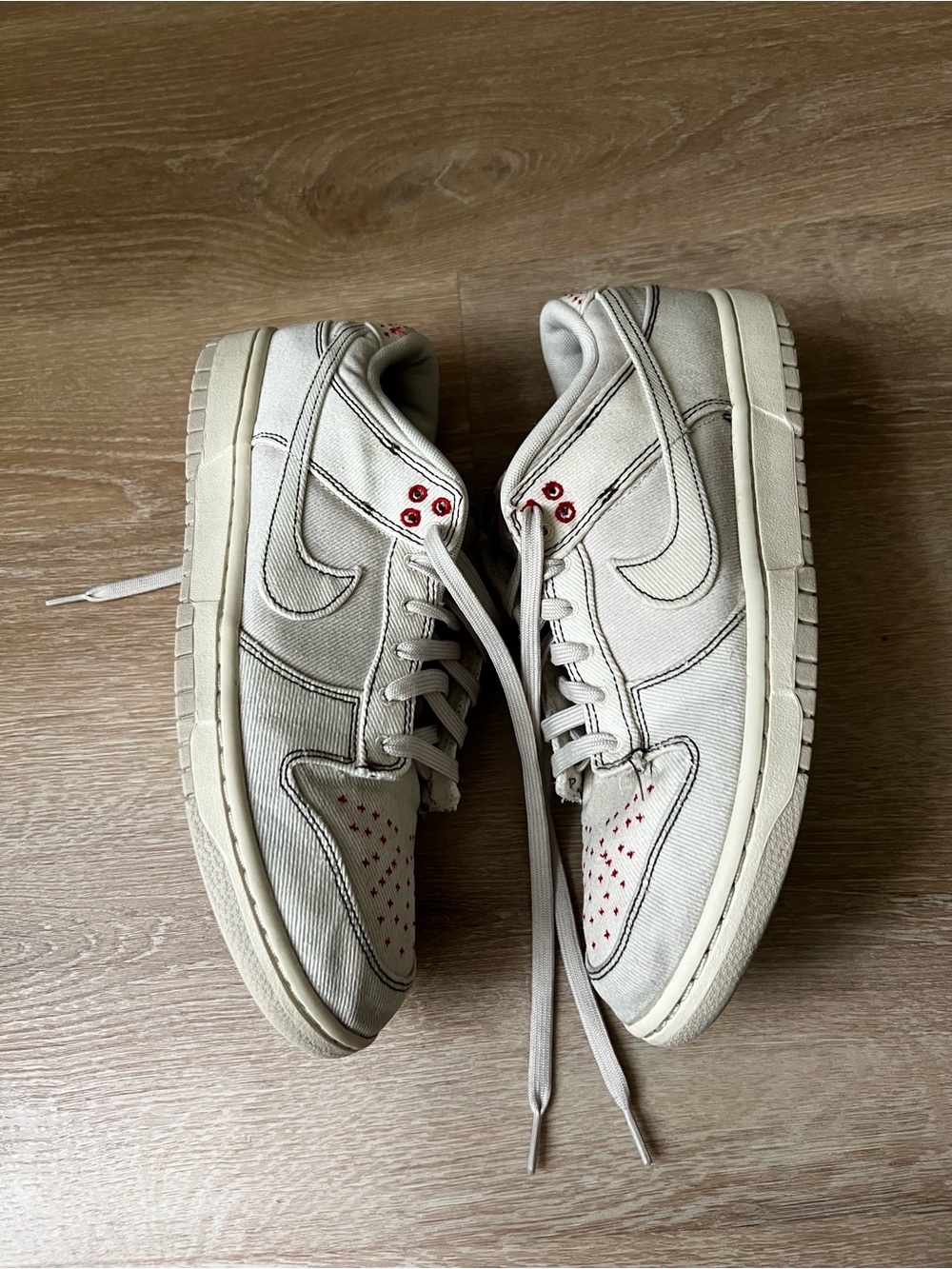 Nike Off-White Low-Top Sneakers with Red Eyelet Details